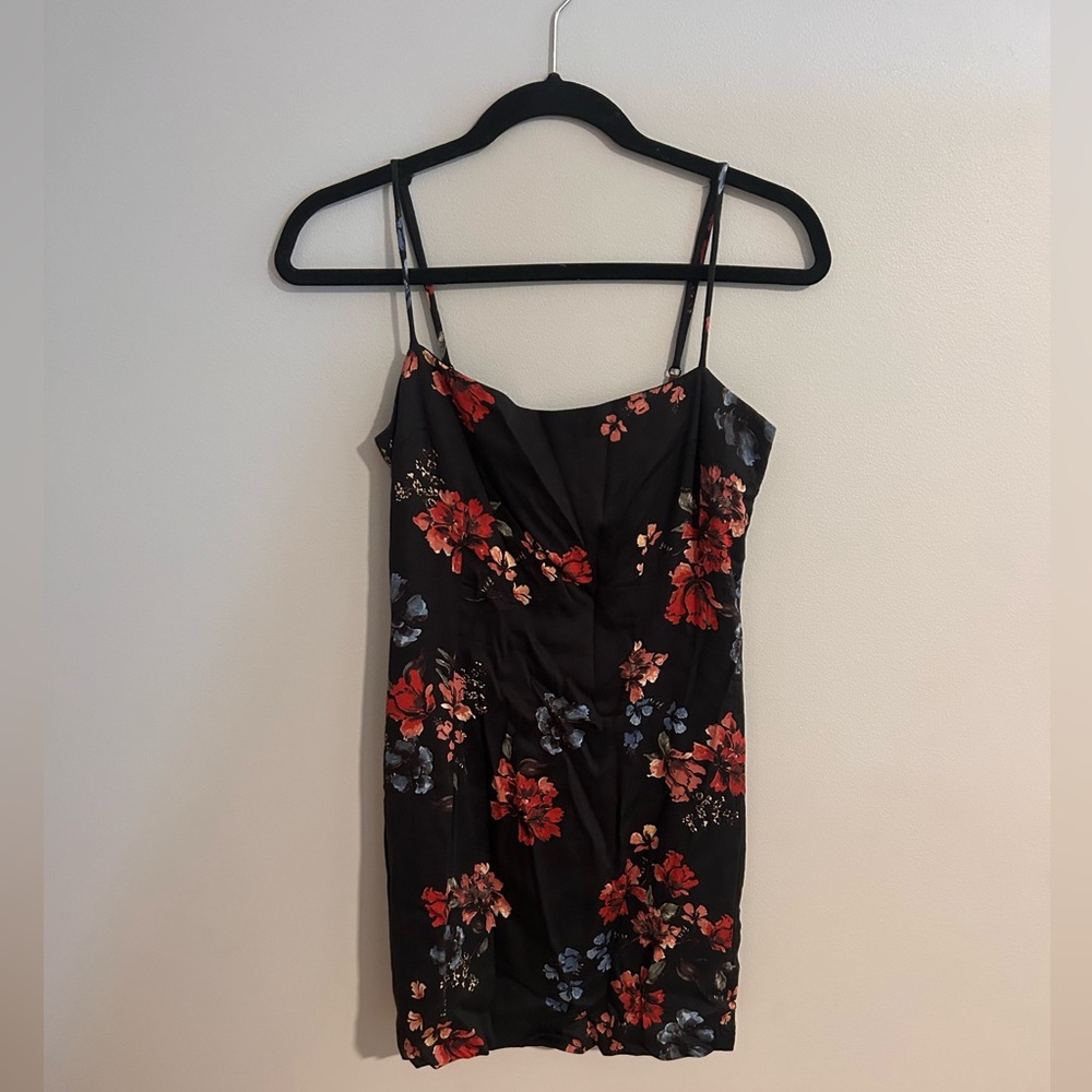 Olivaceous black and floral tight fitted dress. Size medium.